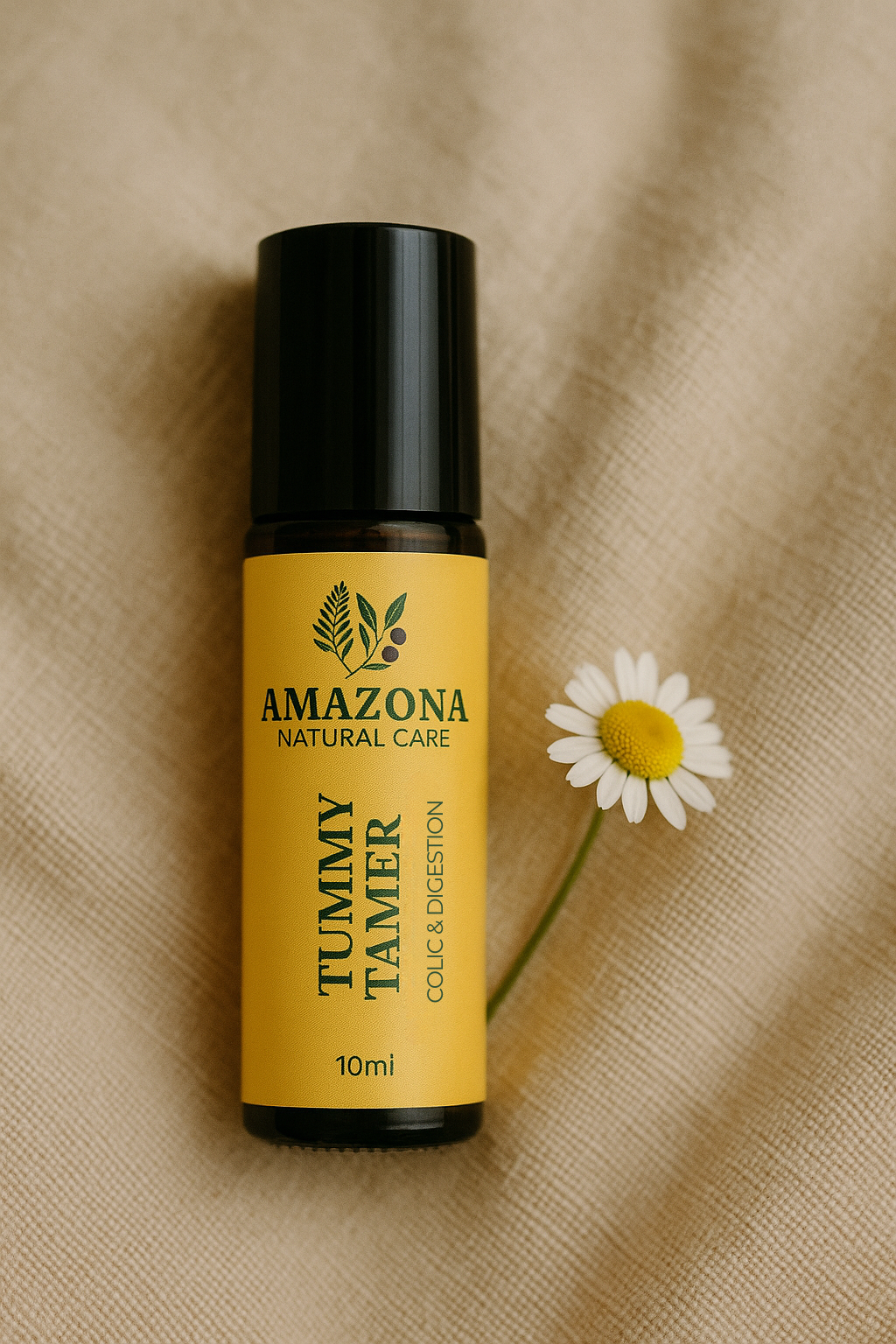 Tummy Tamer essential oil roll-on with chamomile flower