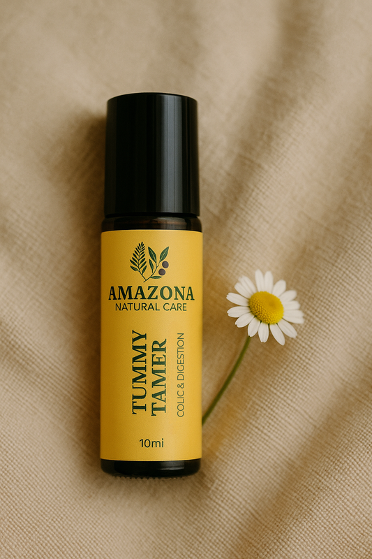Tummy Tamer essential oil roll-on with chamomile flower